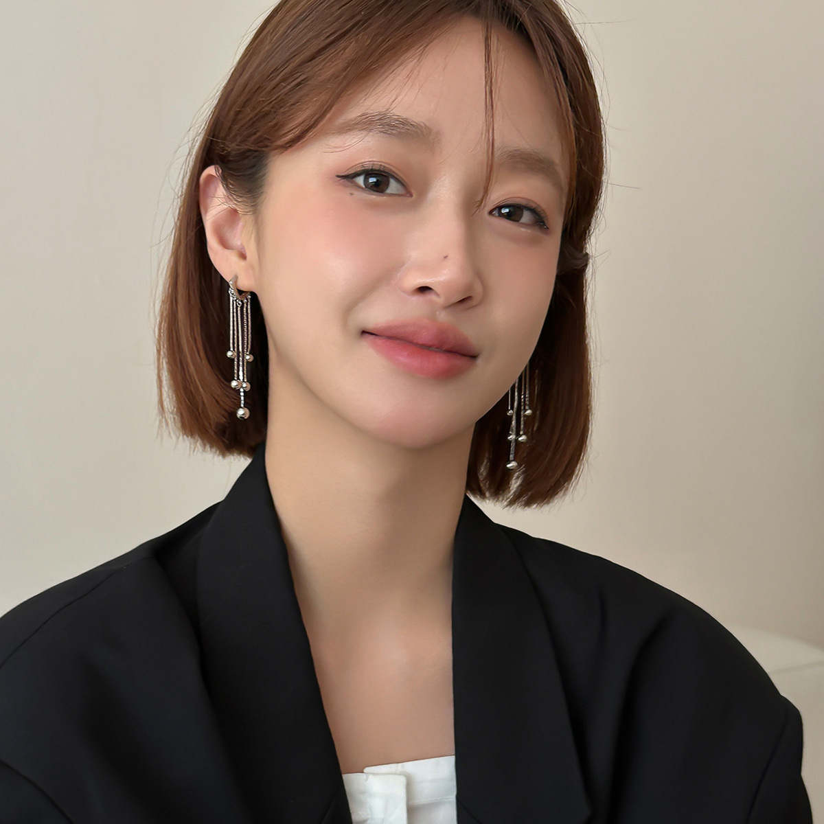 簡約精緻長款流蘇耳環女小眾設計高級感圓球吊墜銀針耳飾新款批發