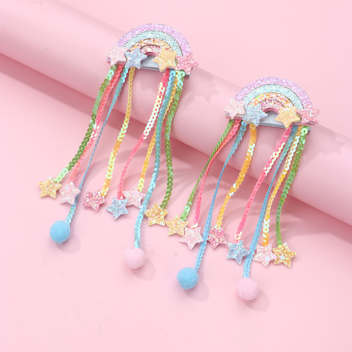 Fermagli per capelli stella arcobaleno con paillettes e nappe_voghion.com