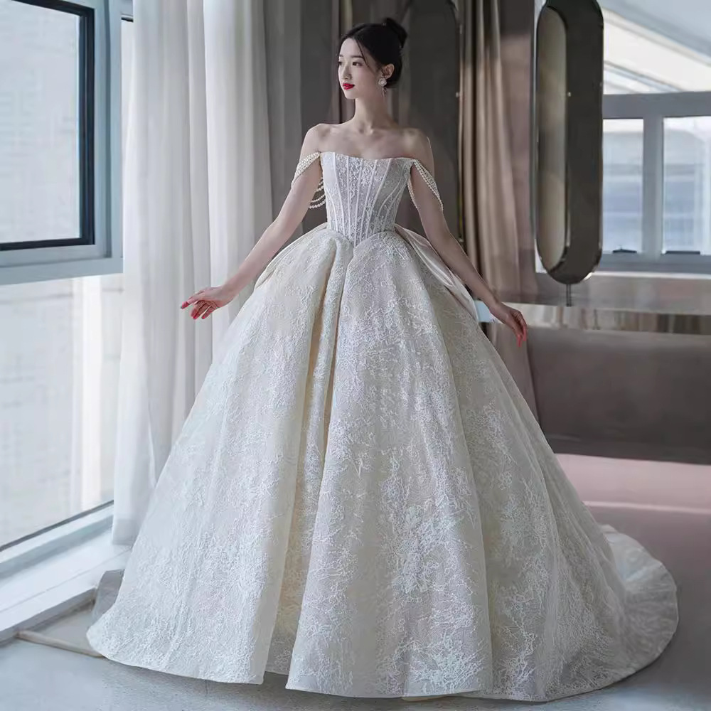 Vestido de novia sin tirantes, nuevo estilo 2026, estilo francés forestal, ligero, con textura vintage, adecuado para figuras pequeñas y de talla grande, con cola.