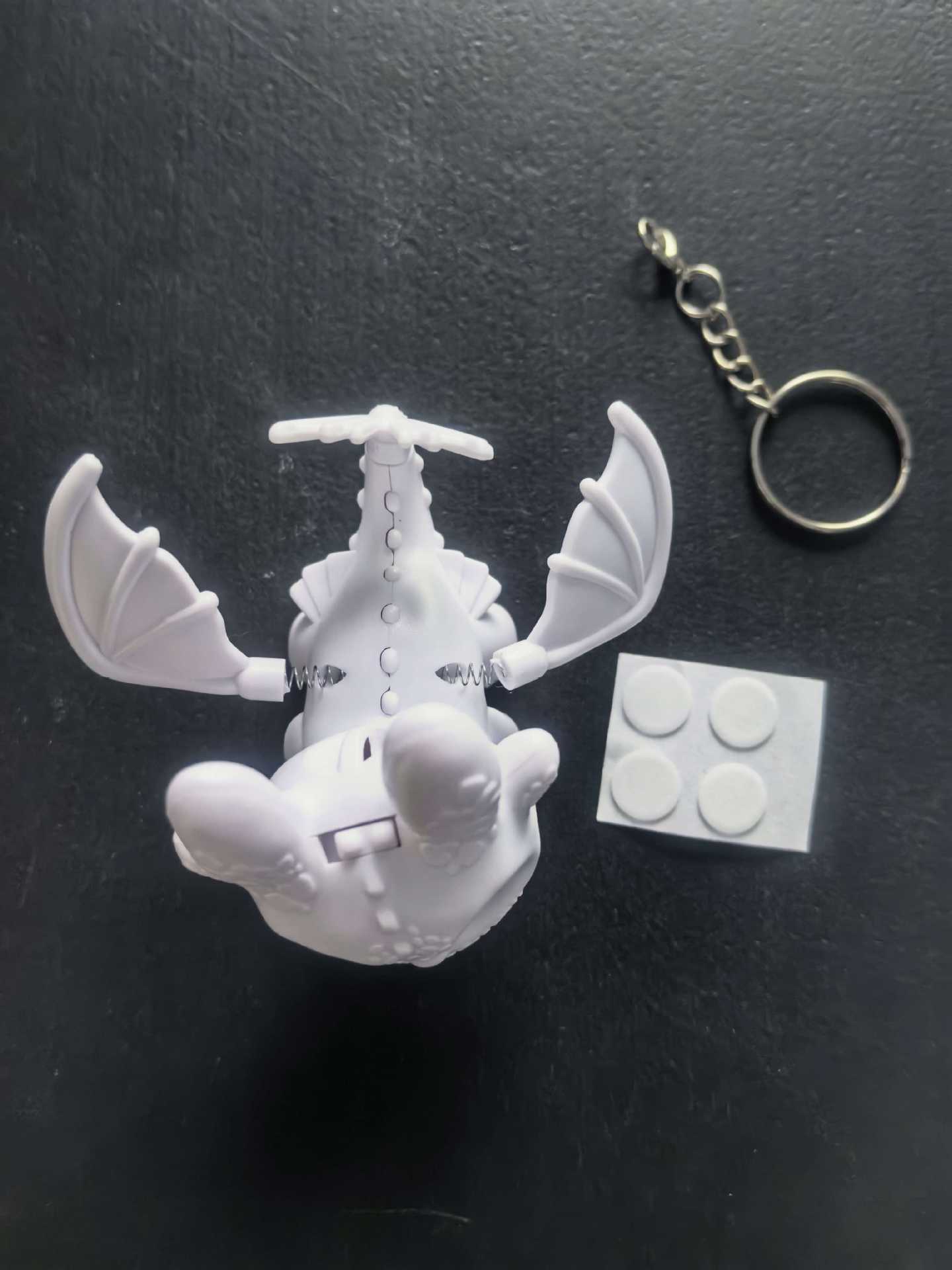 New car accessory: Toothless figure with swinging wings, sensor-activated flashing lights, eyes, keychain accessory, helmet decoration