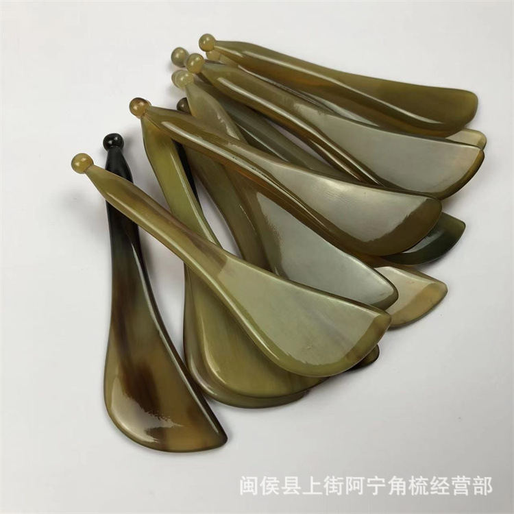 Horn Gua Sha Acupoint Massage Stick 12cm Tendon Plucking Tool for Eye and Body Care in use