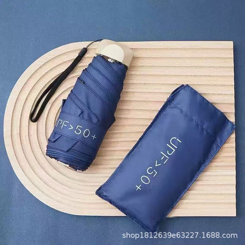 Mayorista gran cantidad de paraguas de cinco plegadas paraguas de sol ligero y pequeño paraguas plegables de bolsillo de vinilo para mujeres