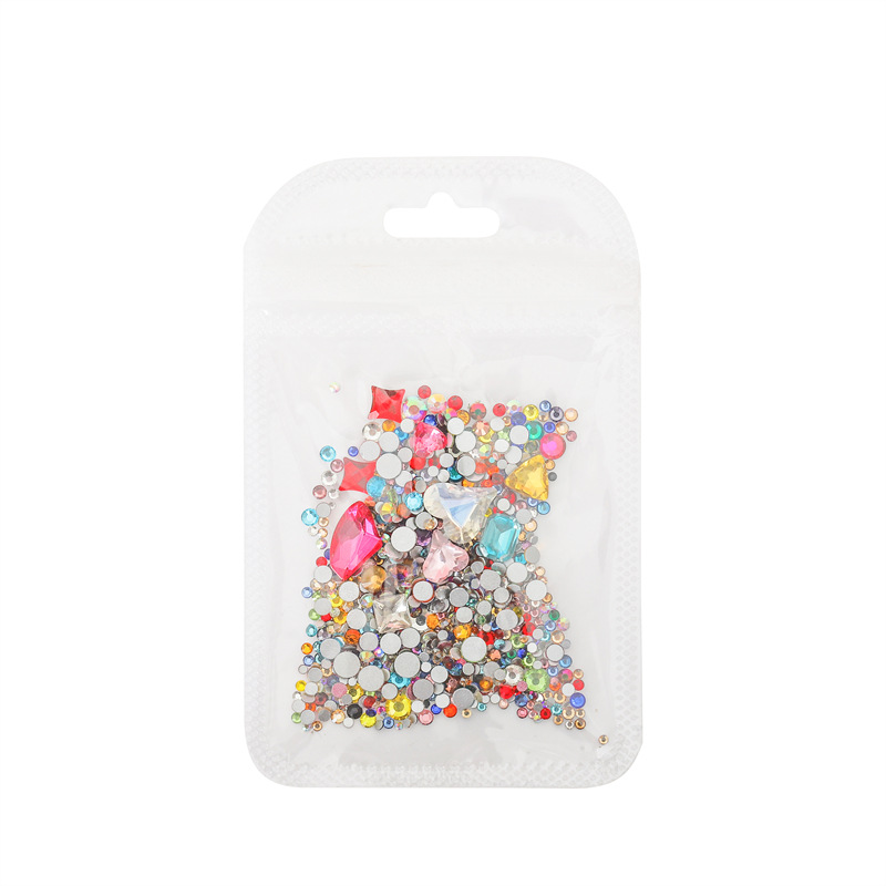 Internet celebridad mono mismo estilo de uñas arte material paquete puntiagudo Fondo hacha en forma de corazón K9 diamante uñas joyas de uñas mixtas