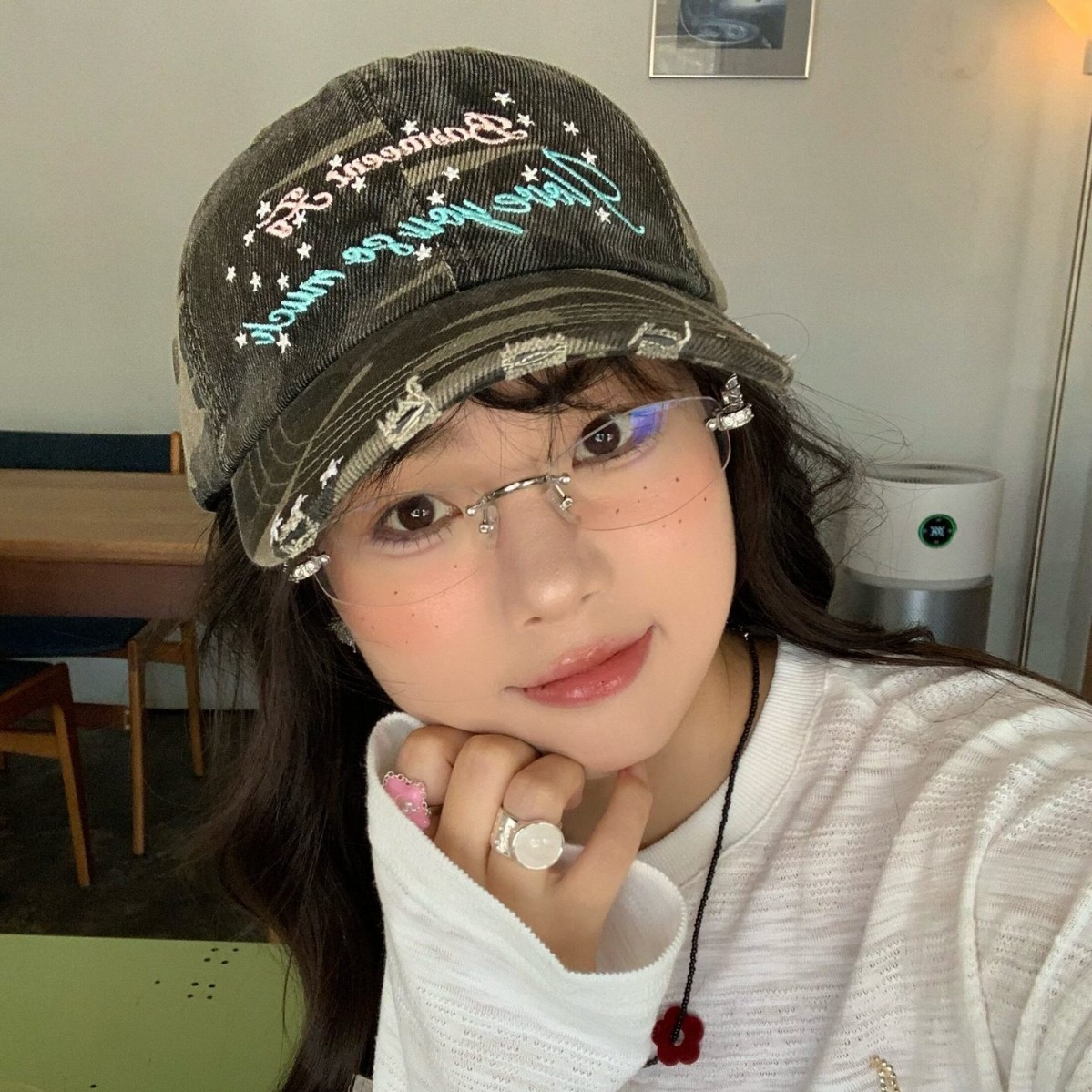 Camouflage baseball cap with letters