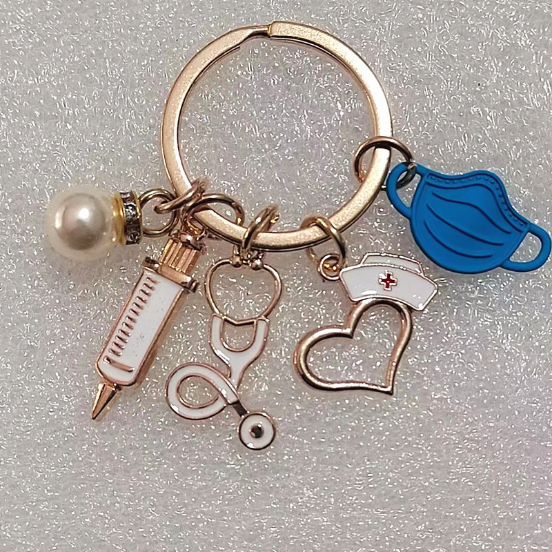 Llavero médico nuevo transfronterizo enfermera doctor jeringa estetoscopio personal
