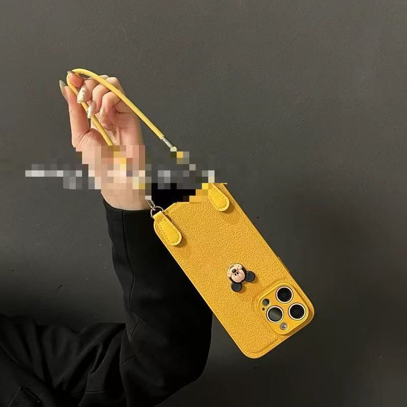 Cordón de Mickey con patrón de hoyos de luna simple para iPhone16ProMax Apple 15 funda para teléfono móvil 14 diagonal 13 hombres y mujeres