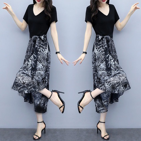 夏の婦人服の気質は腰を収めてやせている半袖のワンピースの女性が流行します。|undefined
