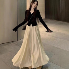 茶系は女性の朝と秋の高級感のある長袖の上着の半身のスカートのファッションの2つのセットを着ています。