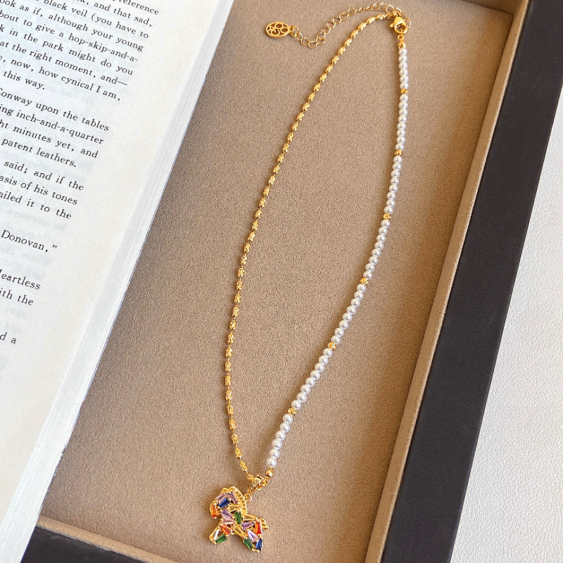 Oro verdadero eléctrico galvanis colgante de piedra pony pendientes collar ligero lujo nicho universal conjunto temperamento alta sensación de joyería mujer