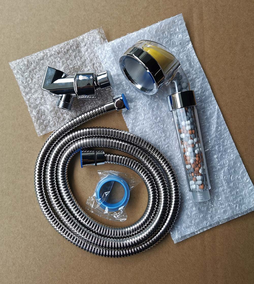 The lemon VC fragrance negative ion shower head cover is equipped with an American-style shower boom adapter and a shower hose fragrance delivery block Item Picture