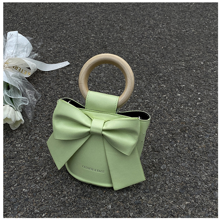 455g Weight Synthetic Leather Lining Material Sewing Thread Fashion Element Magnetic Buckle Closure Type Single Shoulder Strap, Double Handle Strap Type Bucket Bag Bags Type Casual Occasion Pu Leather Material Bow Knot Pattern All Seasons Season Women's Gender Elegant Style Bucket Shape Small Size Women's Small Pu Leather Bow Knot Elegant Sewing Thread Bucket Magnetic Buckle Bucket Bag 38