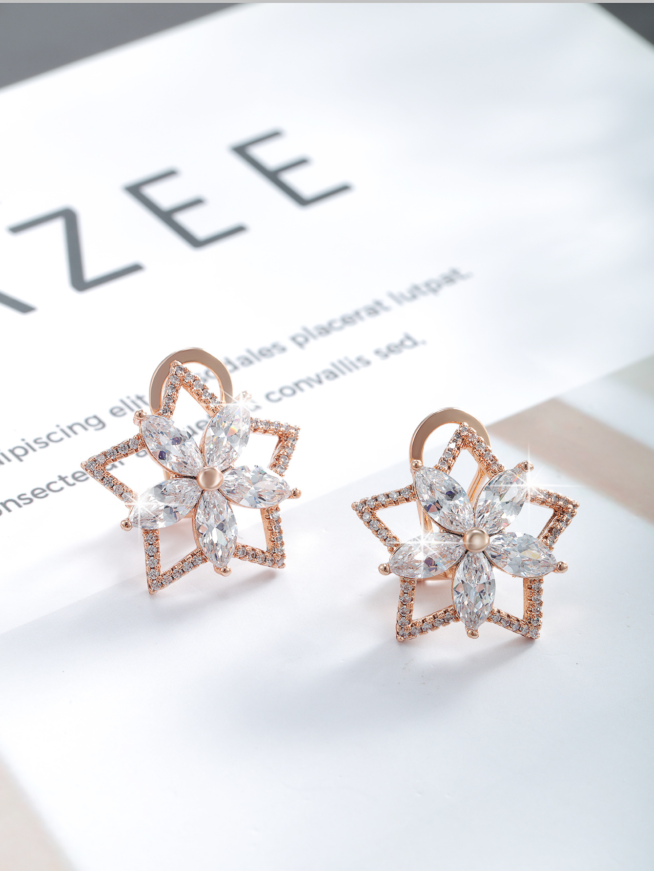 Xupar joyería imitación color tesoro serie estrella de cinco puntas flor Stud pendientes hembra color luz lujo temperamento pendientes de alta calidad