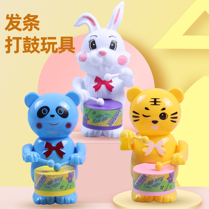 Animales de cuerda como conejo tamborilero, juguete musical para niños