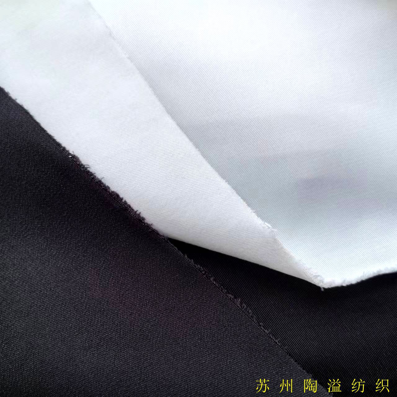 75D*21S涤纱仿记忆黑白现货 夹克风衣派克服外套 裤装休闲服布料