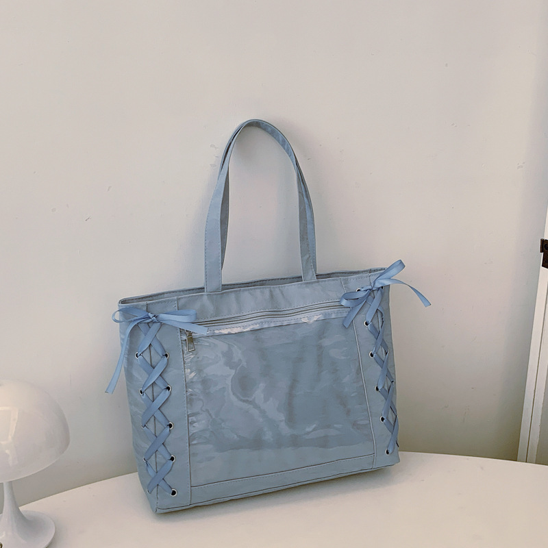 Bolsa de gran capacidad para mujeres dulces niñas de dos dimensiones transparentes 2025 primavera y verano pequeñas bolsas de hombro bajo la axila fresca