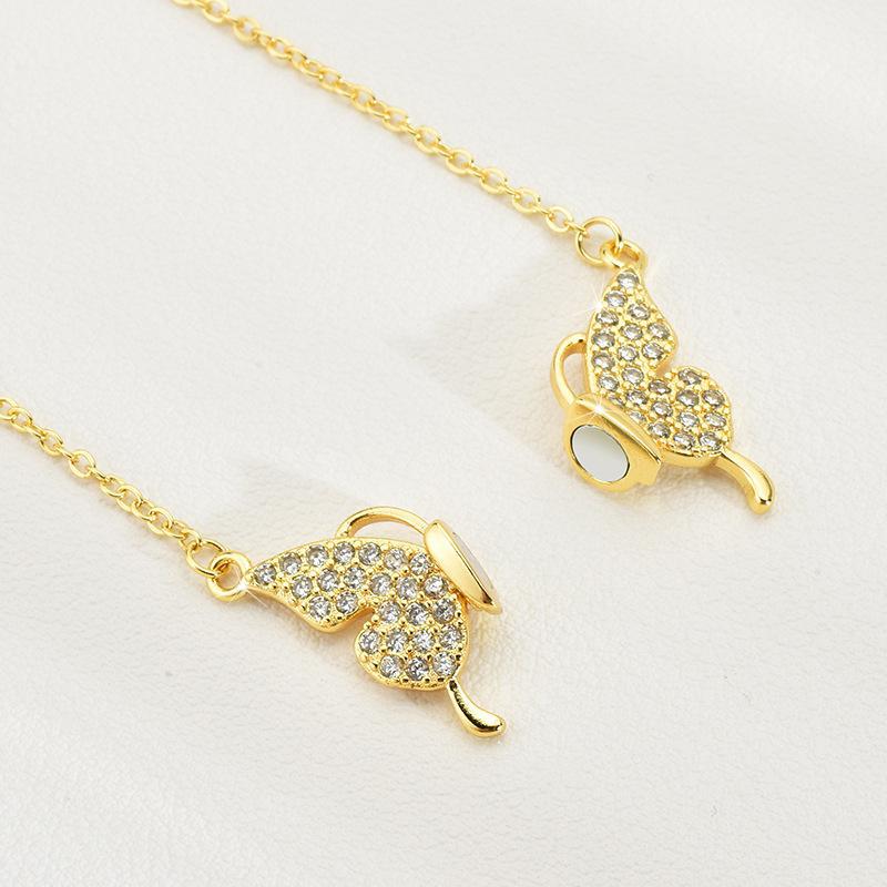 Fábrica directa mariposa collar magnético clavícula femenina cadena verano moda nicho diseño de alto grado no-colisión colgante
