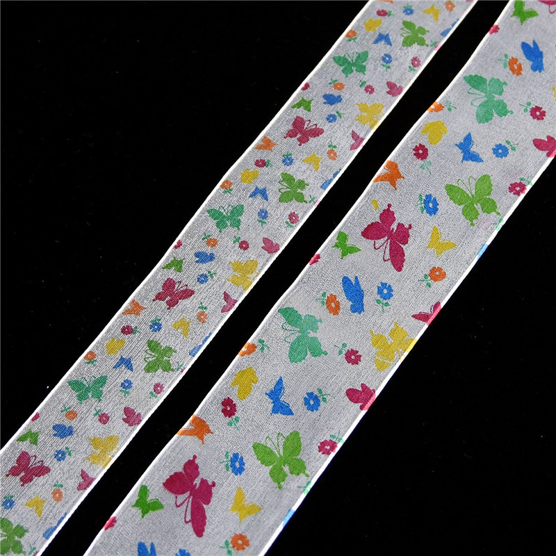 Impresión transfronteriza de primavera mariposa colorida cinta de nieve transparente hecha a mano DIY arco toque de cabello material cinta