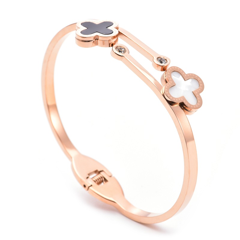 Pulsera de trébol de cuatro hojas blanco y negro de oro rosa