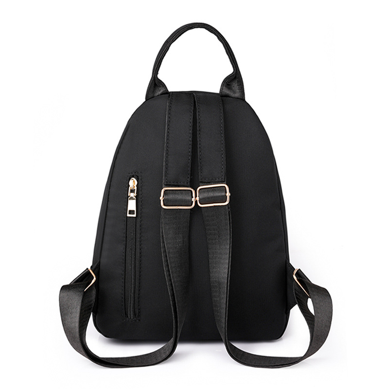 Comercio exterior al por mayor 2023 nueva mochila de nailon para mujer coreana simple mochila de viaje urbano pequeño bolso femenino