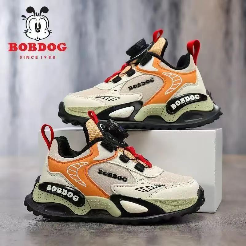 Babu Bean zapatos para niños primavera y otoño 2025 nuevo botón giratorio zapatos de niños de tamaño medio y grande malla transpirable zapatos deportivos para niños