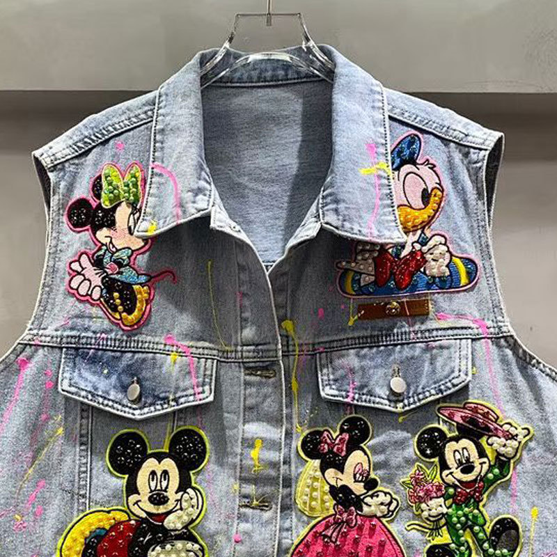 Marca de dibujos animados de marcha europea, graffiti, chaqueta de vaqueros industria pesada, chaqueta media y larga, 2026 primavera, nueva chaqueta suelta