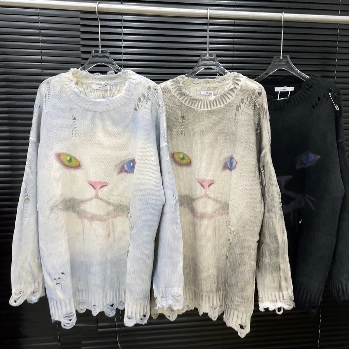 2025年早秋新款猫咪印花破洞圆领宽松毛衣慵懒风宽松针织衫上衣