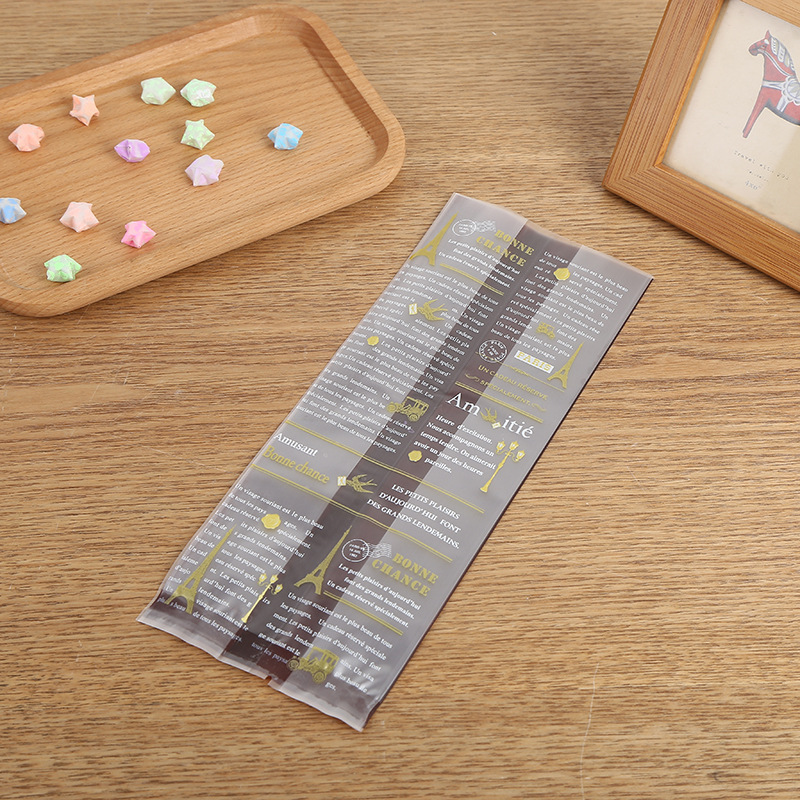 10*25摩卡法风半透明磨砂塑料袋英文铁塔背封平口烘焙饼干袋50/包