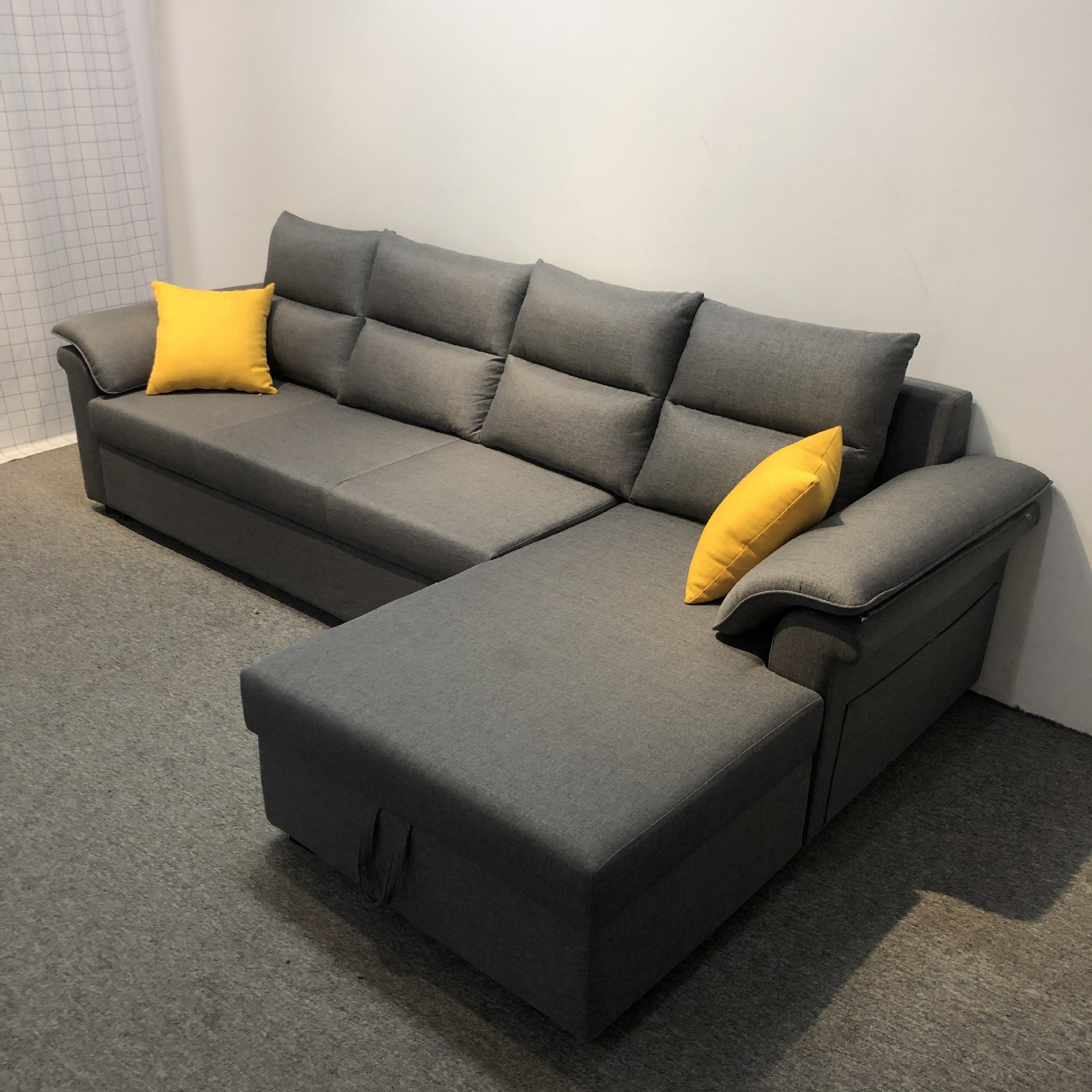 Tecnología de tela de esquina sofá correa de almacenamiento VIP simple sala de estar moderna pequeña combinación de sofá cama plegable doble uso