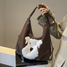 休闲通勤大容量女式双肩包2024新款百搭后背包多用单肩托特水桶包