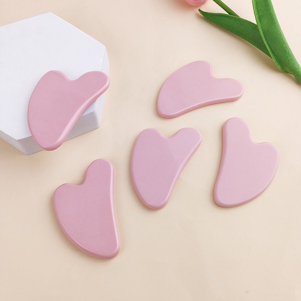 批发定制粉色无孔陶瓷刮痧板 面部美容紧致拨筋心形陶瓷刮痧