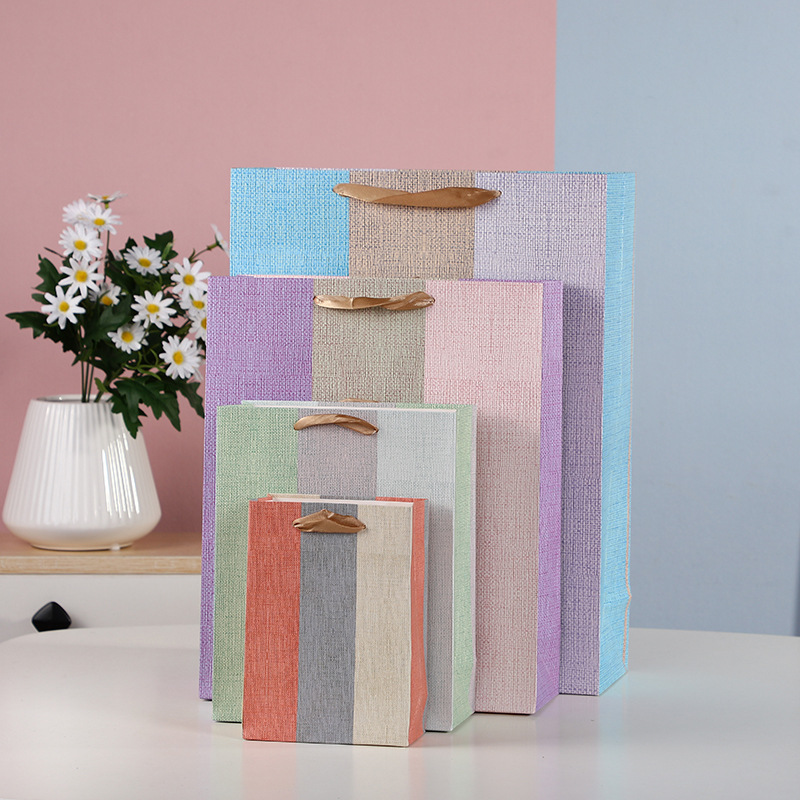 新款现货简约三色竖条格印花手提礼品袋服装商场购物纸袋