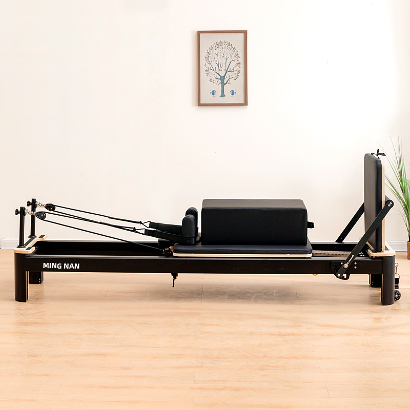 Pilates aluminio núcleo cama pequeña cama blanca y negra sala de yoga reformador de pilates reformador