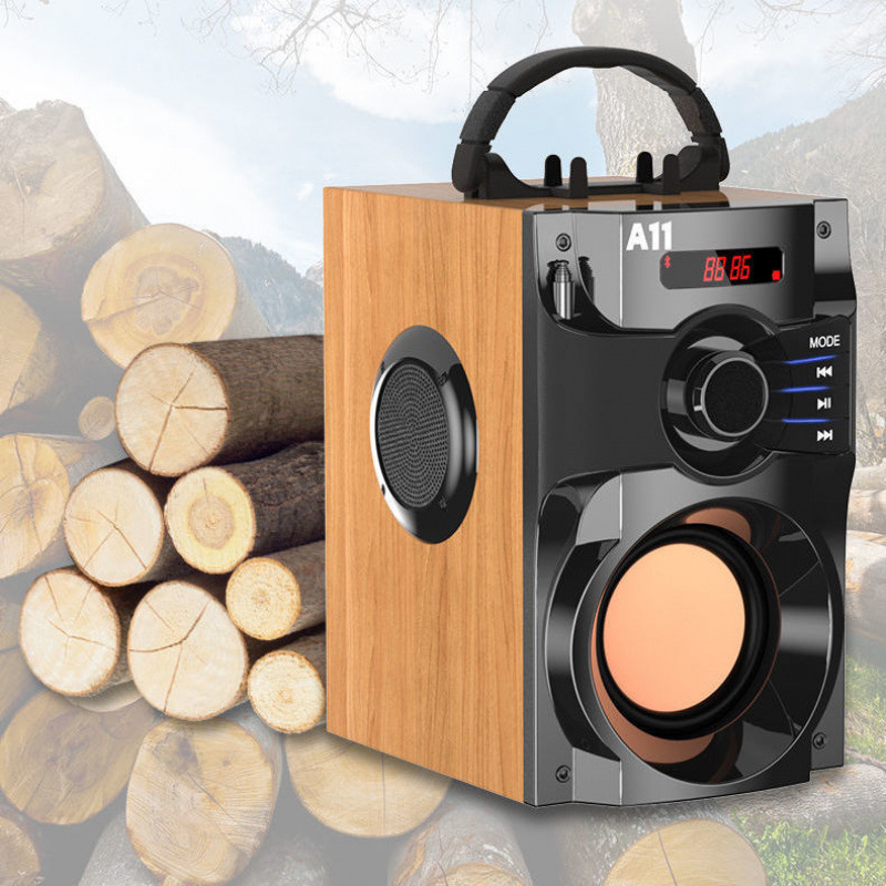 Altavoz Bluetooth inalámbrico de madera, alto volumen, subwoofer pesado, tarjeta de teléfono móvil doméstico, audio de canción K portátil al por mayor