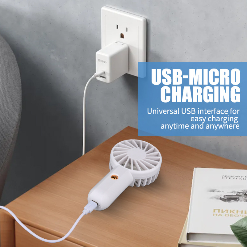 Nuevo niño pequeño ventilador de mano transfronterizo en vivo ventilador de bolsillo portátil cuello colgante con cuerda de carga mini ventilador