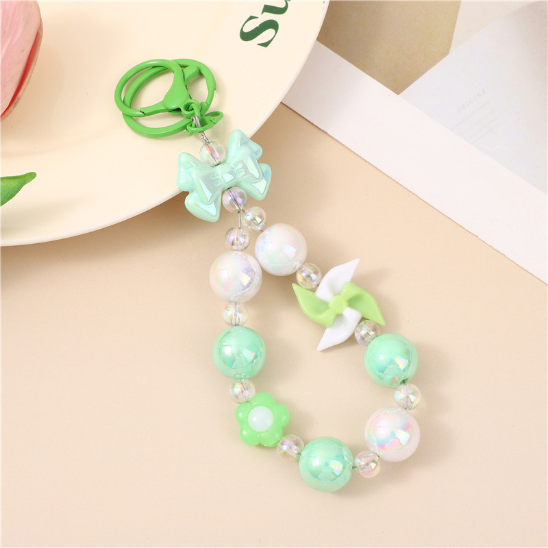 Japón y Corea del Sur color ins hecho a mano con cuentas flor llavero cordón de muñeca macaron color pétalo cordón de teléfono móvil en stock