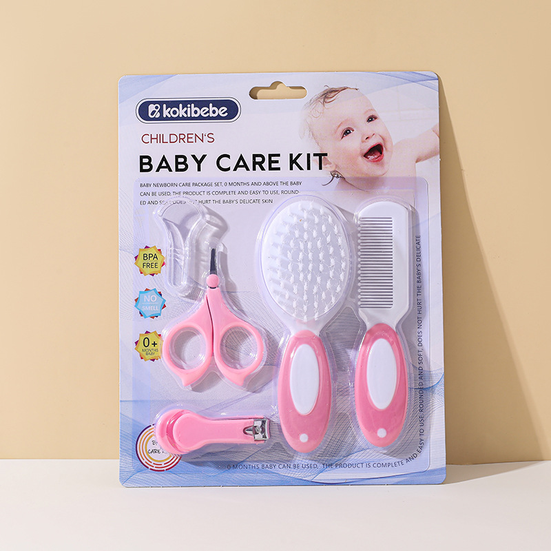 Envases en inglés transfronterizo Juego de cuidado de cepillo de peine de lana para bebés Tijeras de seguridad para bebés Herramienta de limpieza de cortaúñas