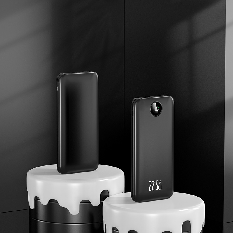 Los fabricantes suministran mini banco de energía portátil para viajes al aire libre, batería, pantalla digital de color sólido de gran capacidad, fuente de alimentación móvil multicolor