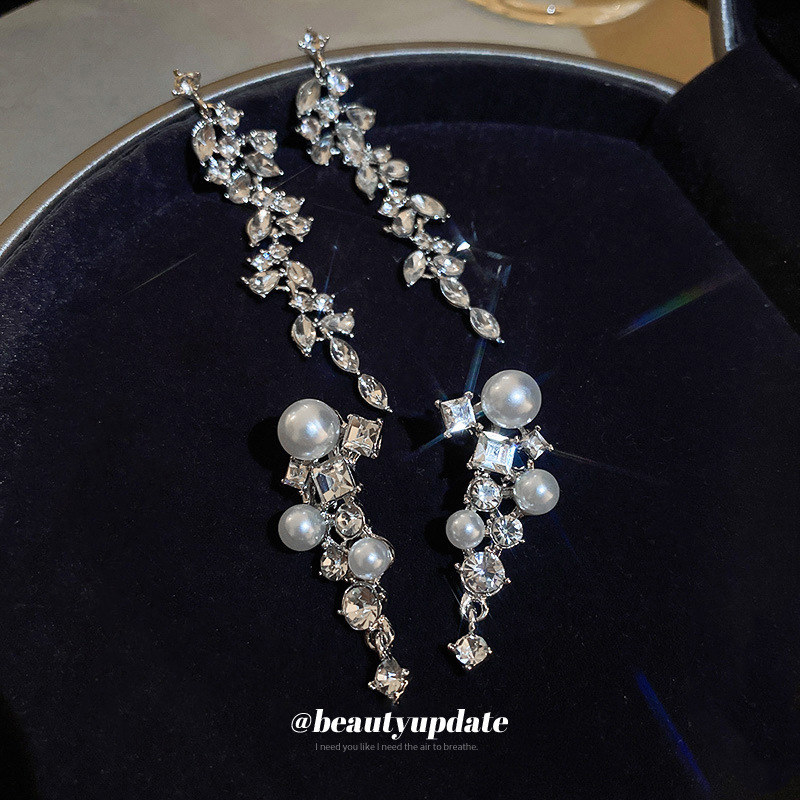 Pendientes de borla geométrica de la Perla del diamante de la aguja de plata Pendientes de temperamento exagerados europeos y americanos pendientes de moda al por mayor para las mujeres