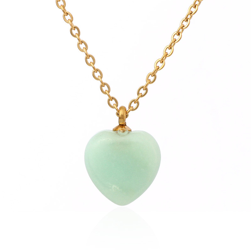 Conjunto de joyería europea y americana Collar de piedra natural en forma de corazón Pendientes de amor Verano femenino Advanced Sense No se desvanece Joyas de acero de titanio