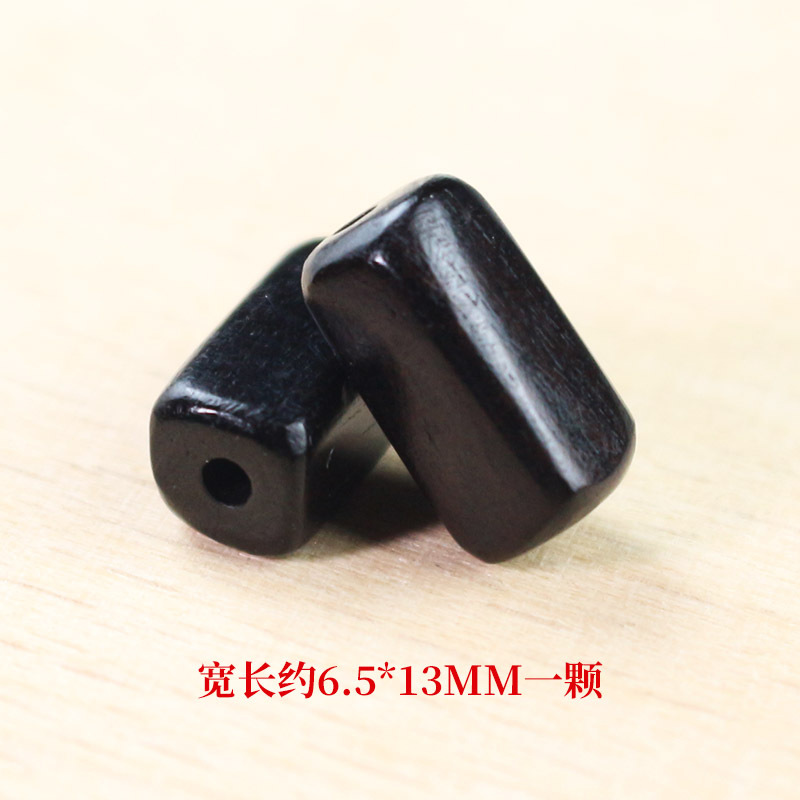 Fábrica al por mayor cuentas de madera cuentas sueltas accesorios de joyería DIY material cuentas de madera redondas procesamiento de sándalo púrpura cuentas de madera de ébano