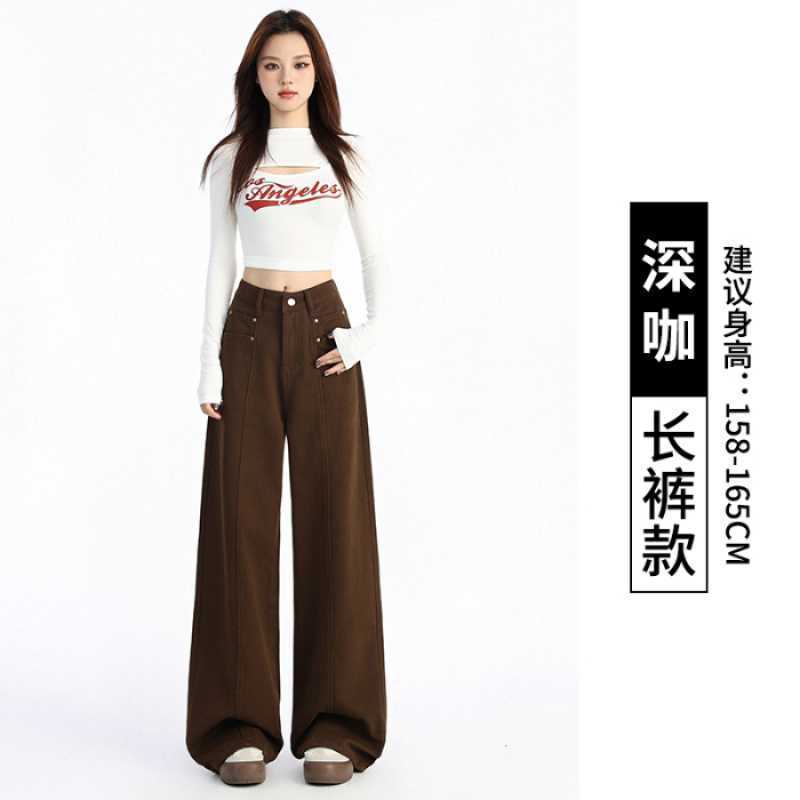 春と秋のカレー色のストレートジーンズの女性のゆったりとしたレトロなハイウエストはやせています。|undefined