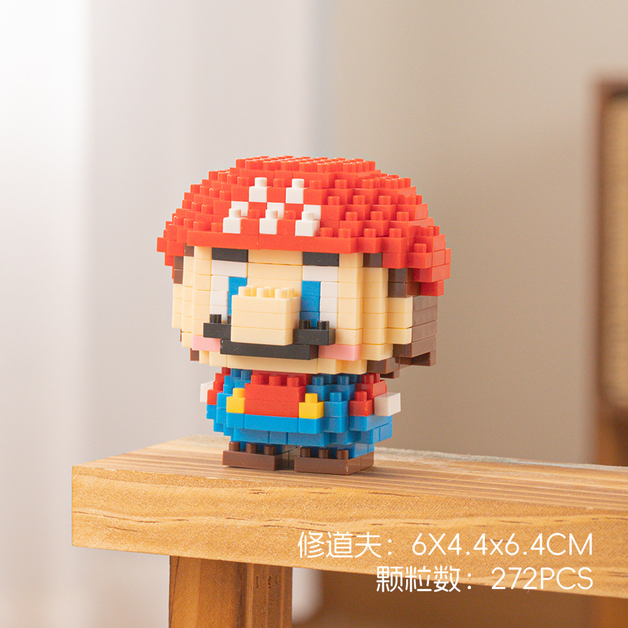 Compatible con Lego muñeca de dibujos animados micro partículas frambuesa oso montado bloques construcción juguetes educativos puesto ciego caja regalo al por mayor