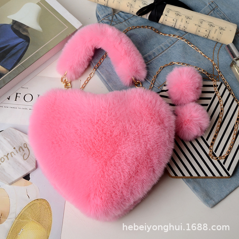 Fabricante en stock bolsa de corazón de melocotón portátil moda felpa en forma de corazón bolsa de peluche bolso de las mujeres