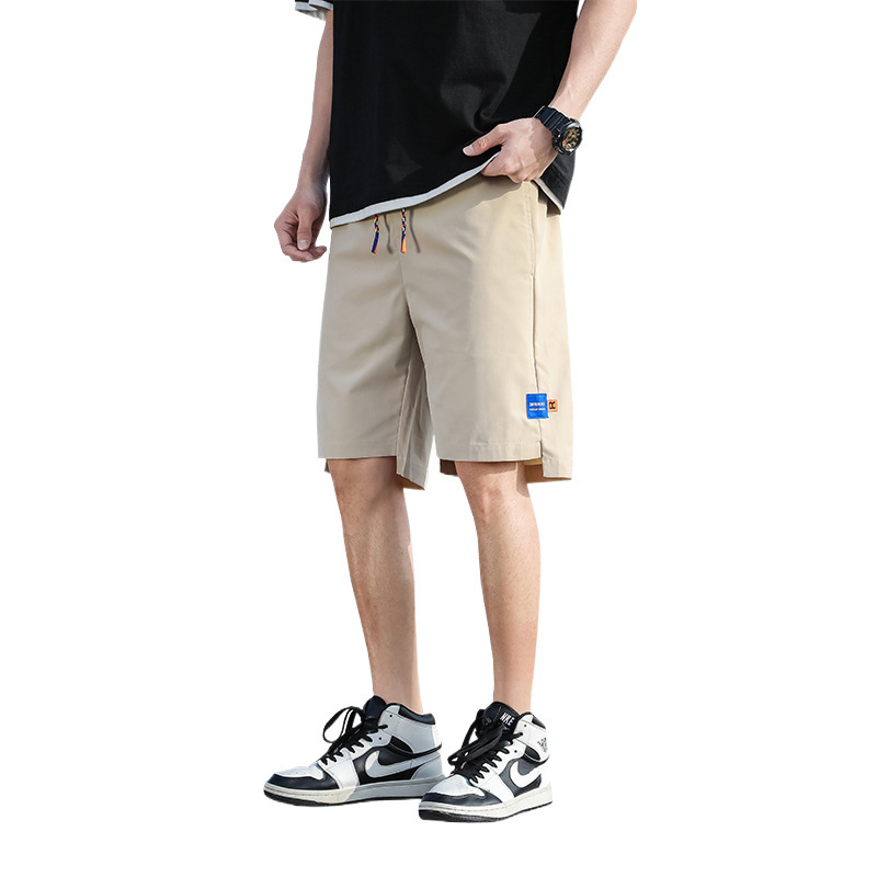 Pantalones de verano para hombres, pantalones cortos casuales de moda para hombres, pantalones de playa sueltos, fábrica directa.