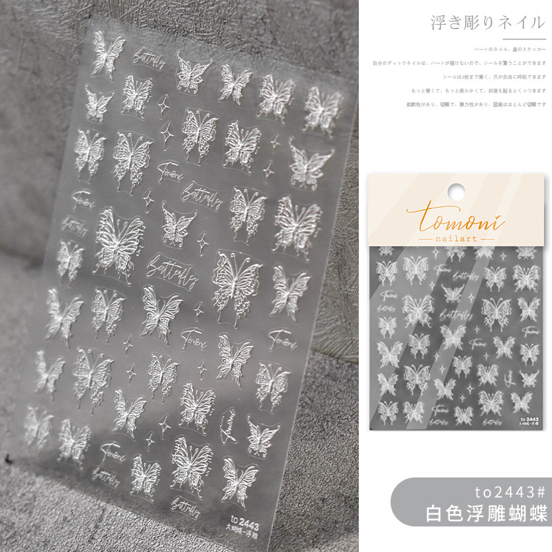 Estilo japonés líquido mariposa pegatinas de uñas estampado láser de alivio de metal pegatinas hueco retro impermeable uñas pegatinas al por mayor
