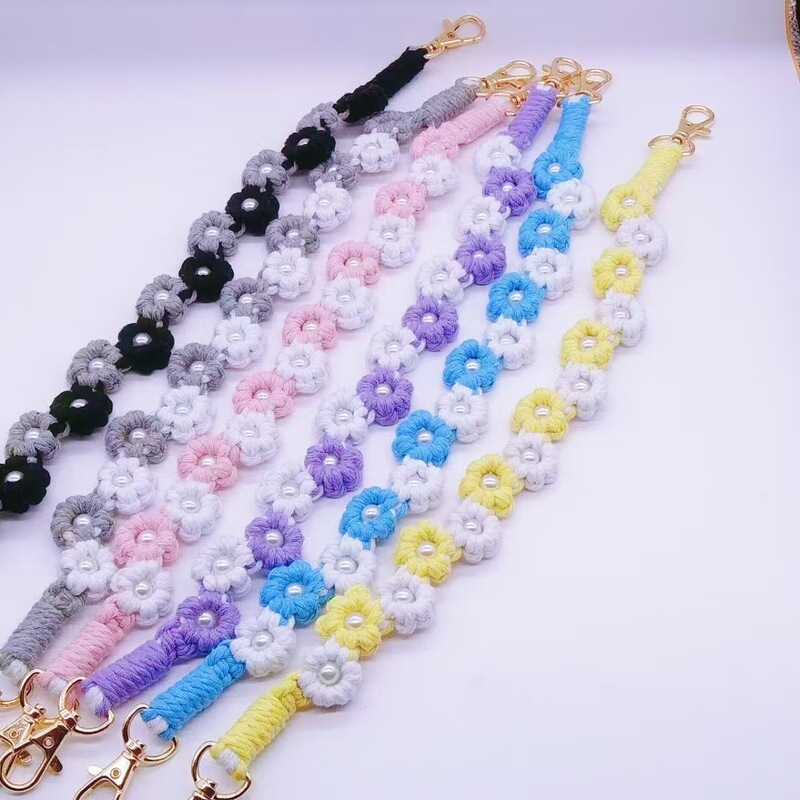 Cross-border new multi-functional pendant pendant handmade woven flower cup rope mobile phone chain daisy keychain