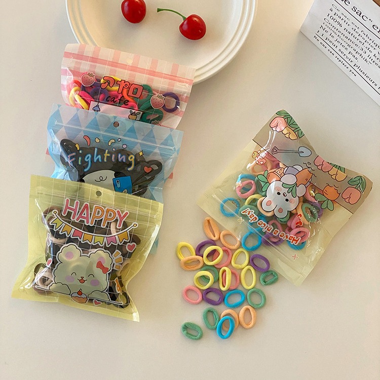 100 paquetes _ colorido pequeño bebé anillo de cabello para niños cuerda de cabello alta elástica no lesionada banda de cabello para mujeres con joyas de cabello para niñas