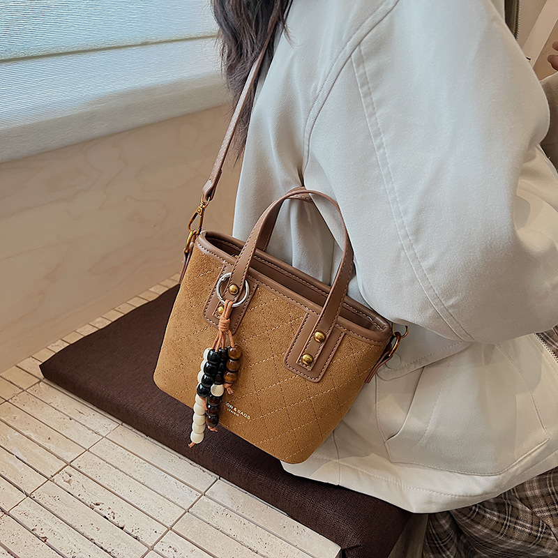 Transfronterizo retro gamuz bolsas de cubo de mano para mujeres 2025 nuevo estilo universal