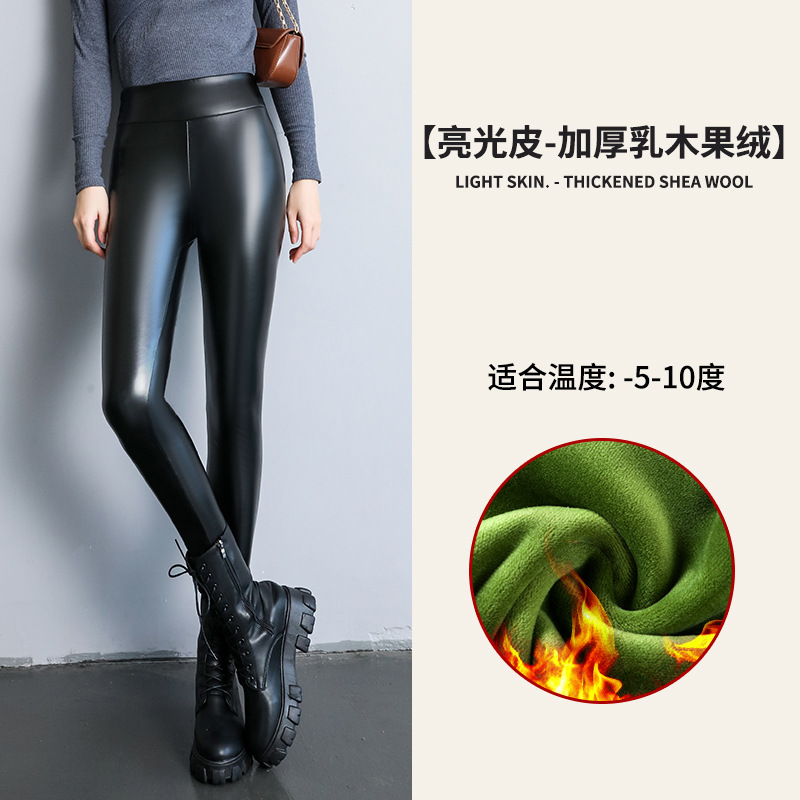 Pu革のズボンの女性の秋冬のズボンの底のズボンとベルベットの厚い腰はやせて見える防風の防水の外は外国貿易の卸売りを着ます。