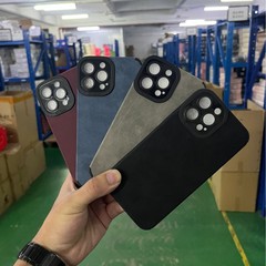 純色の瞳の目の小さい羊の皮の復古的な毛皮の携帯の箱はiPhone16の冬の猫の目に適応して皮を貼ります。